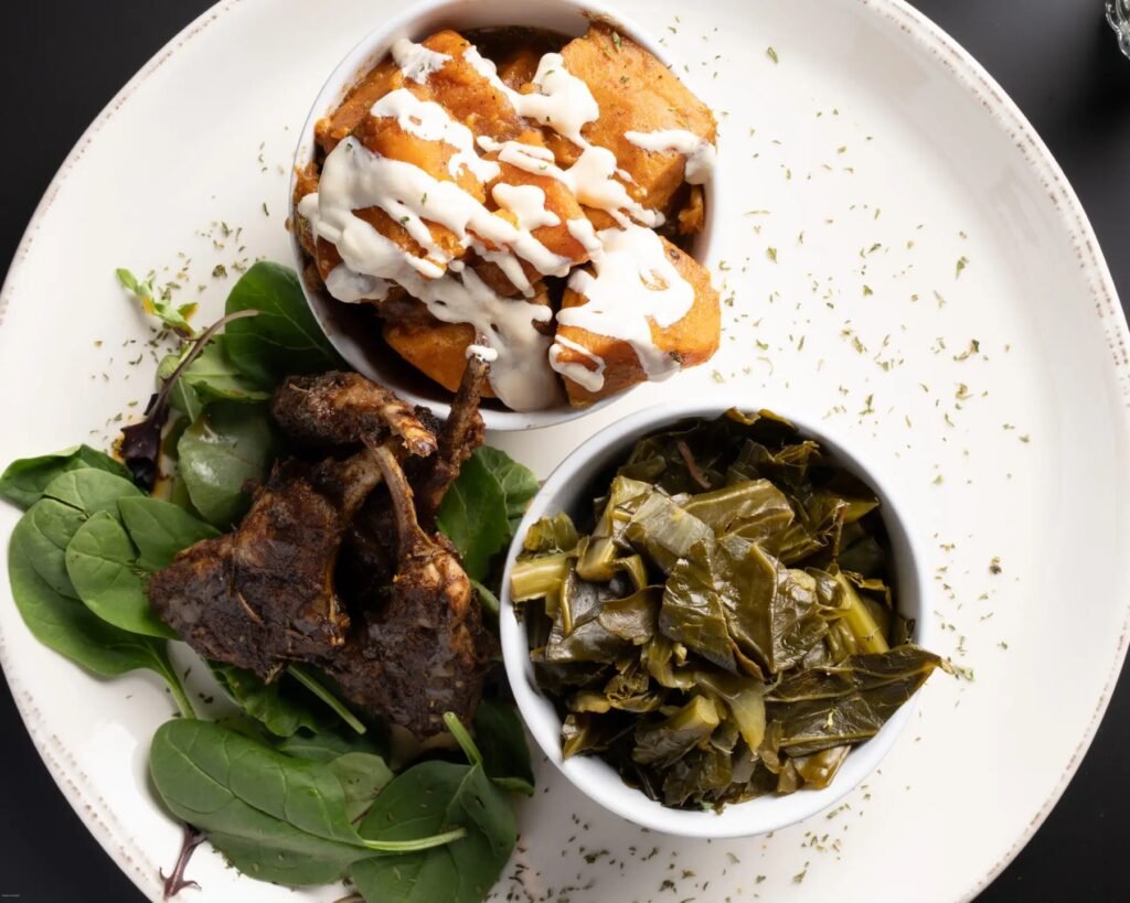 Lamb chops with candied yams and collard greens